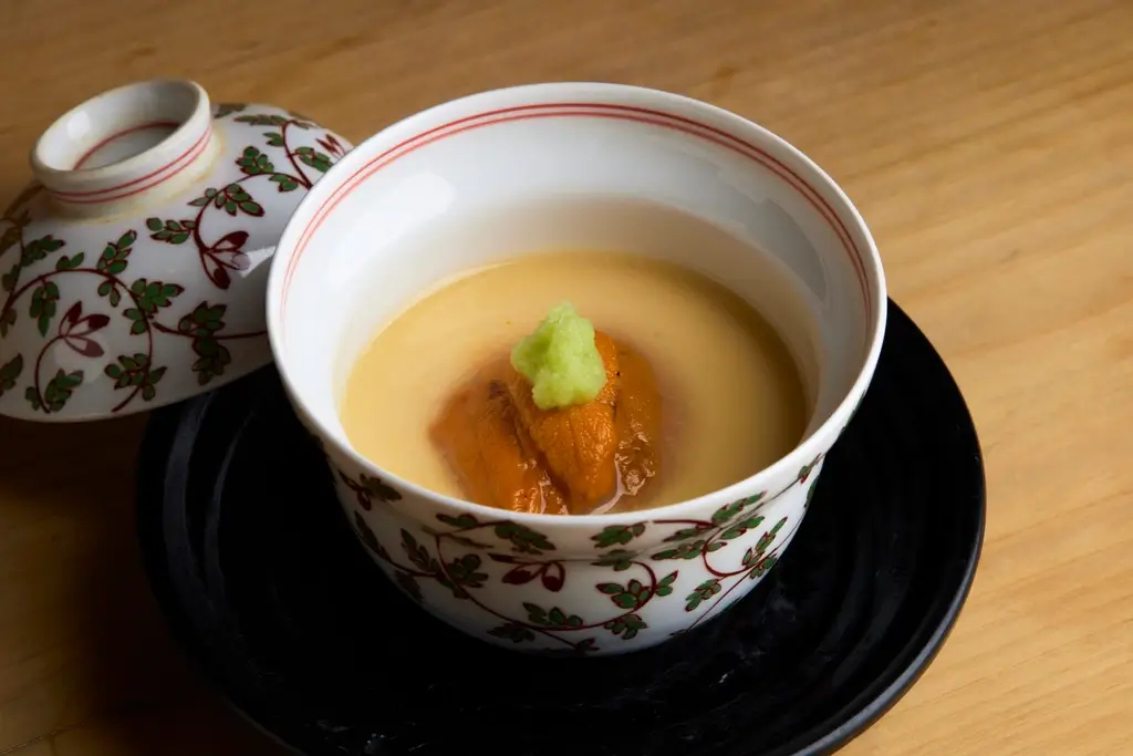 A bowl of uni soup from Sushi Kazuya.