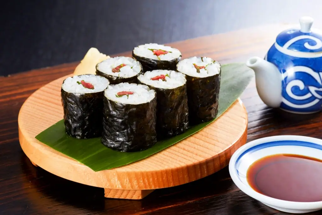 A platter of ume shiso maki sushi.