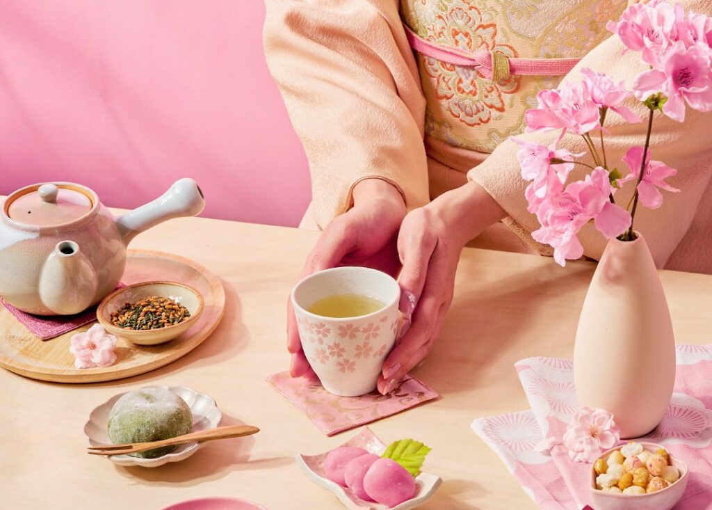 Sakuraco Shop - Japanese snacks and tea woman in a kimono holding a tea cup