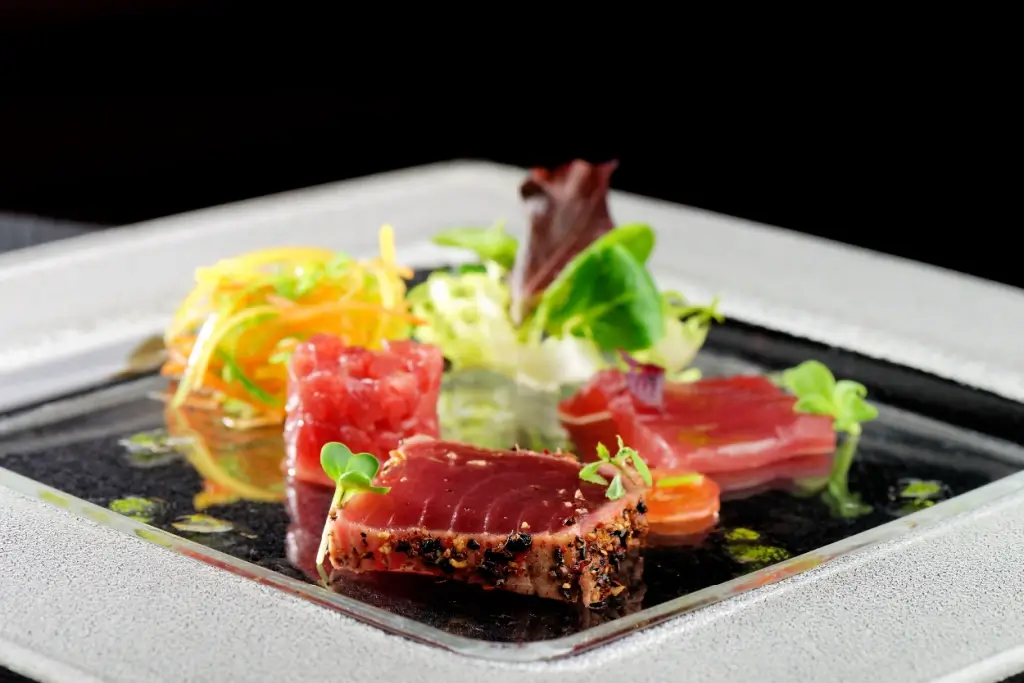 A seared tuna dish from a fine dining restaurant.