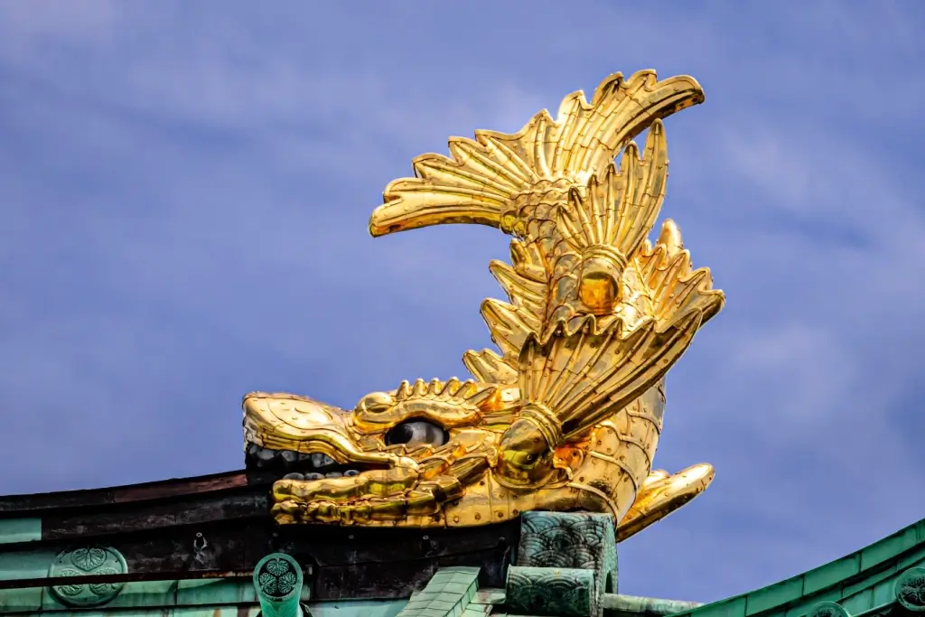 A gold cornerstone koi on the roof of Nagoya Castle.