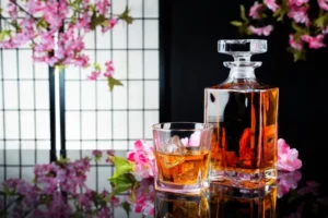 A glass and decanter of Japanese whiskey.