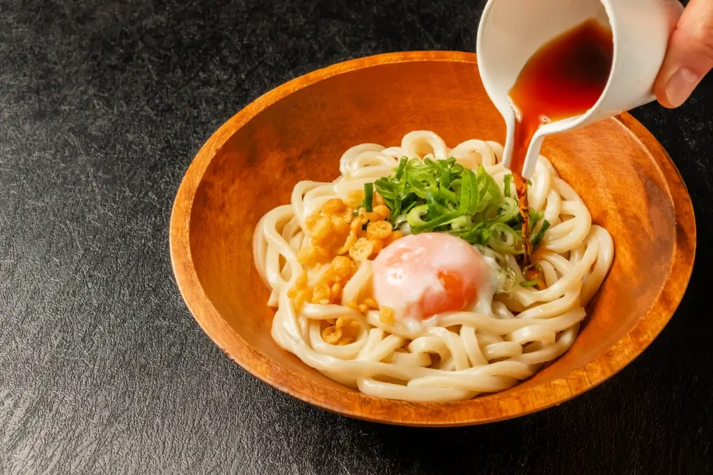 A bowl of cold udon noodles.