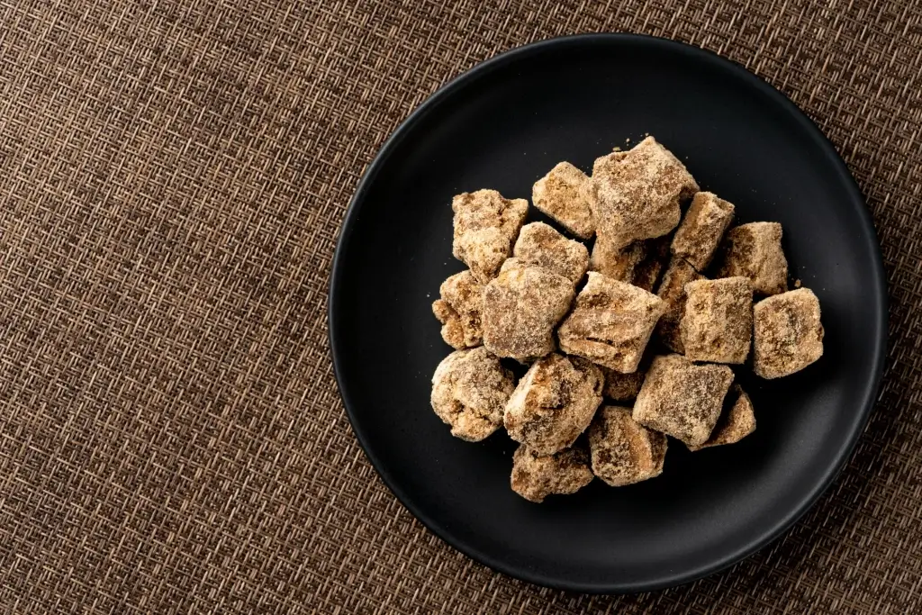 A plate of kokuto brown sugar.