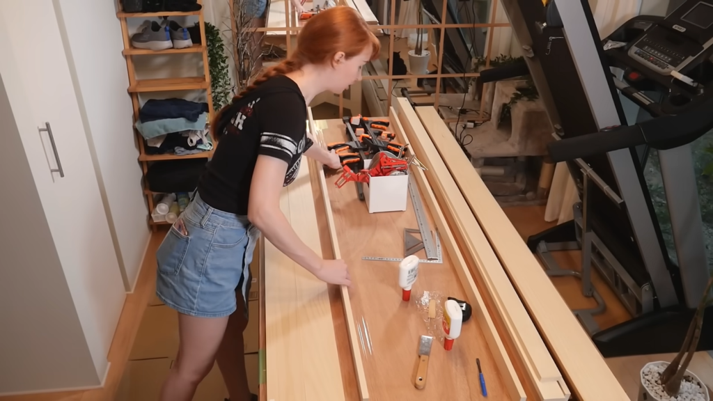 Rachel assembling the herb garden shelf